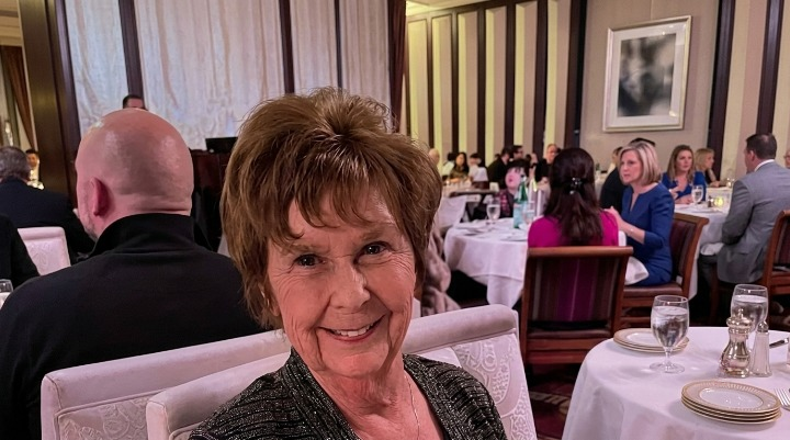 Senior woman at restaurant dinner